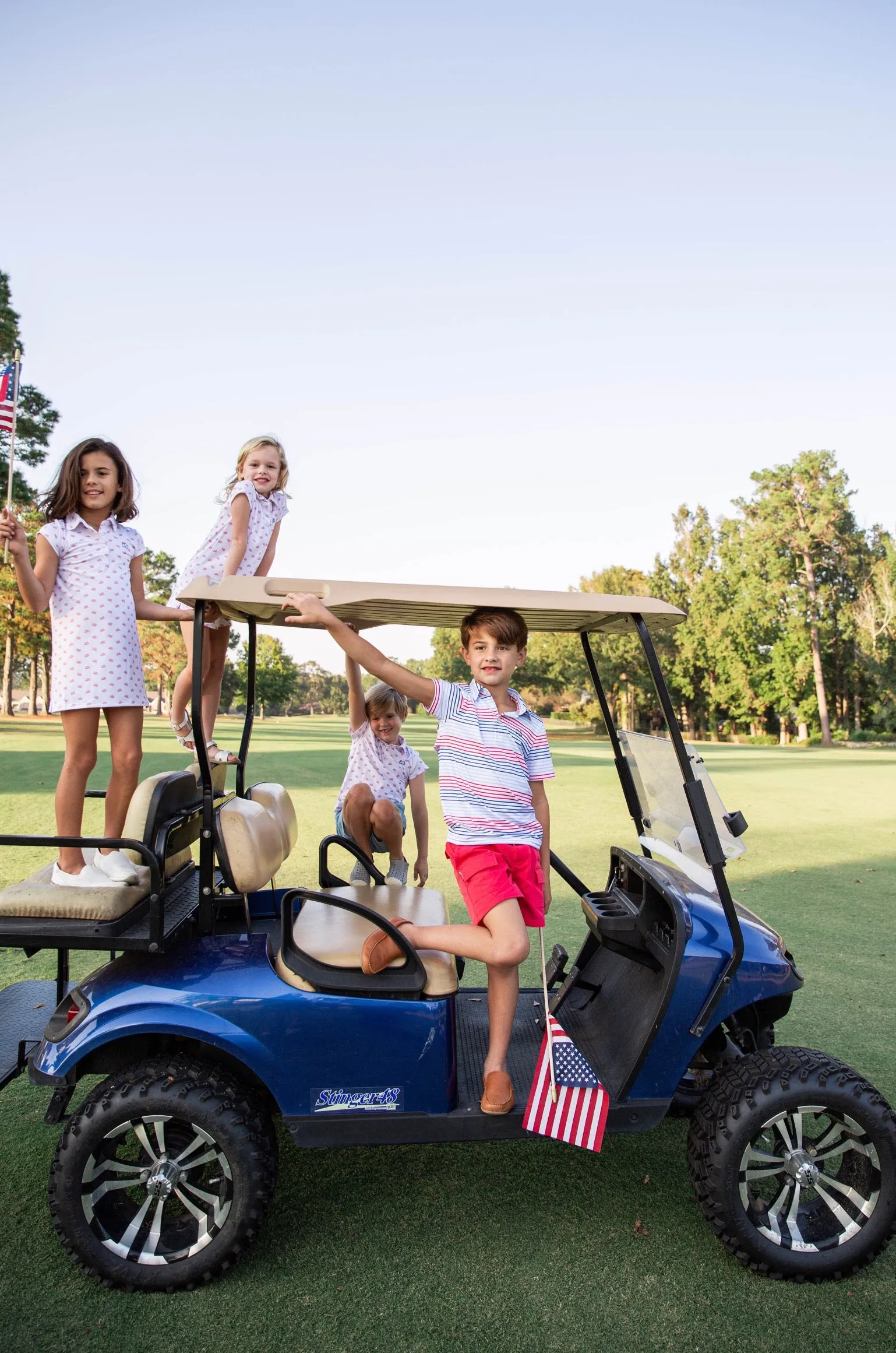 Boys Short Sleeve Pro Performance Polo in Americana Stripe